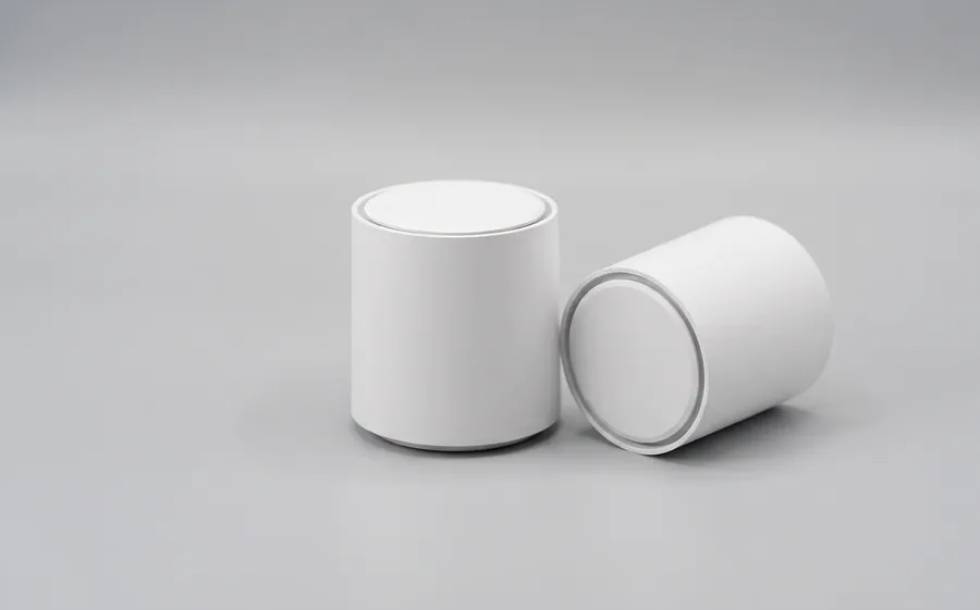 Two round white mesh nodes, one upright and one on its side