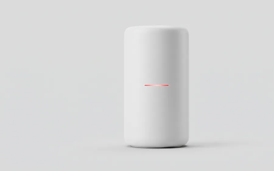 A white cylinder-shaped router with a thin red status light
